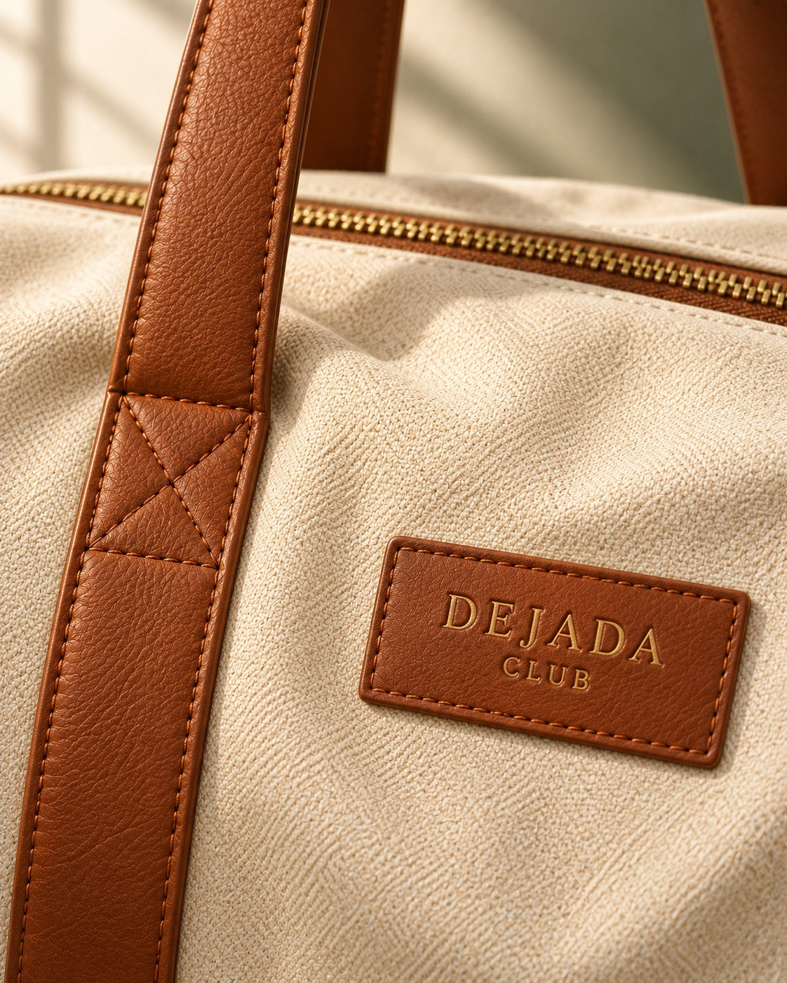 Debossed DEJADA CLUB patch and cognac strap