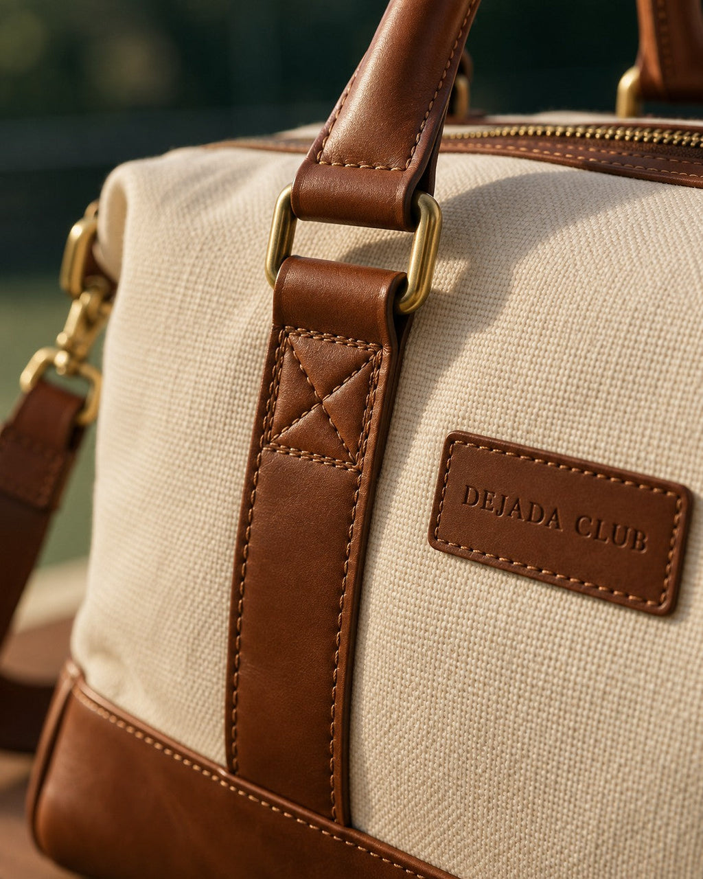 Cognac strap, brass-tone hardware and canvas detail