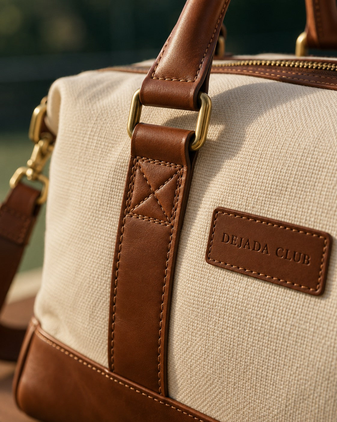 Cognac strap, brass-tone hardware and canvas detail