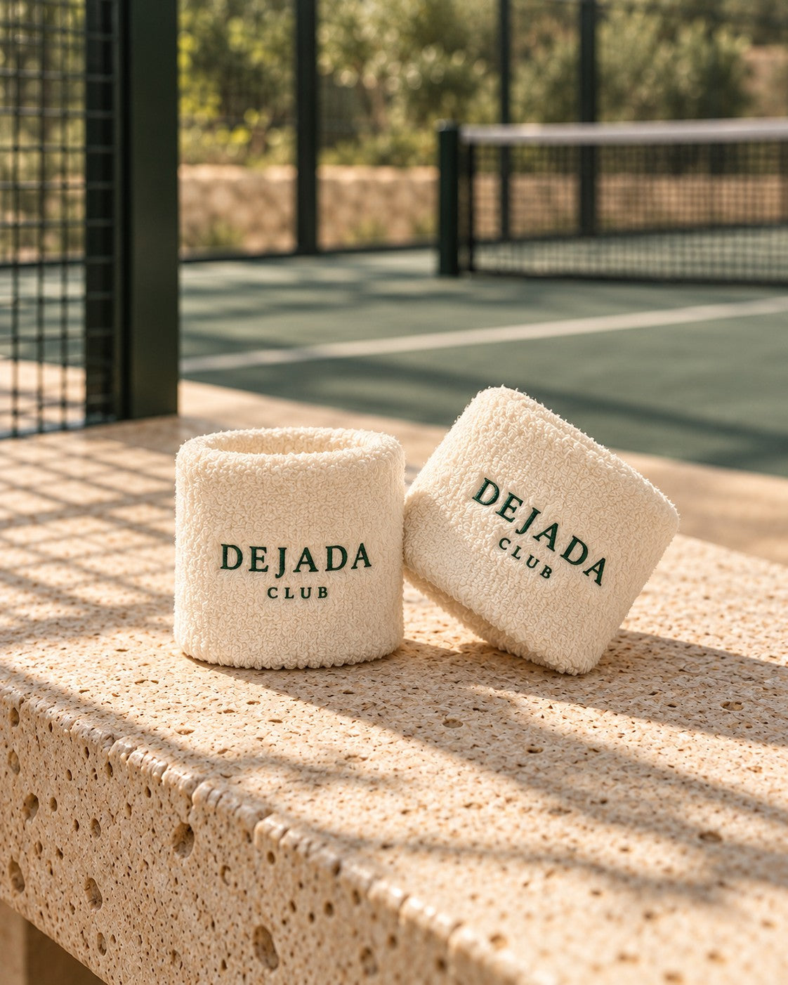 Terry wristbands with Dejada Club embroidery
